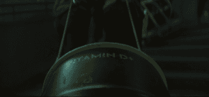 A Vitamin D+ barrel being carried through Silo 18 in Silo Season 3 Episode 2.