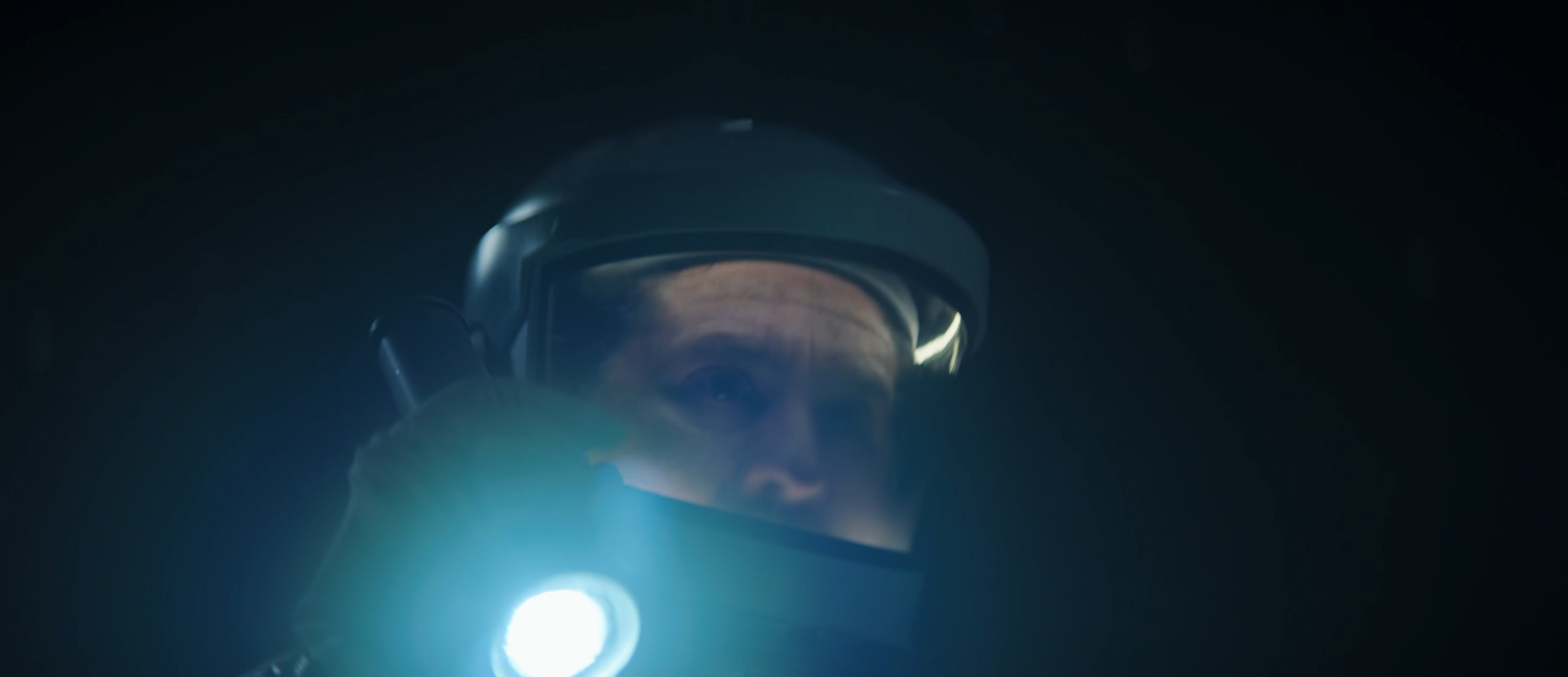 Kennedy wearing his helmet near Silo 17 in Silo Season 3 Episode 7.