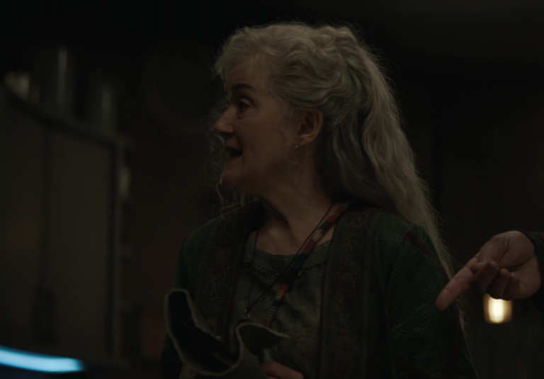Gloria holding Mission’s diary in Silo Season 3 Episode 7