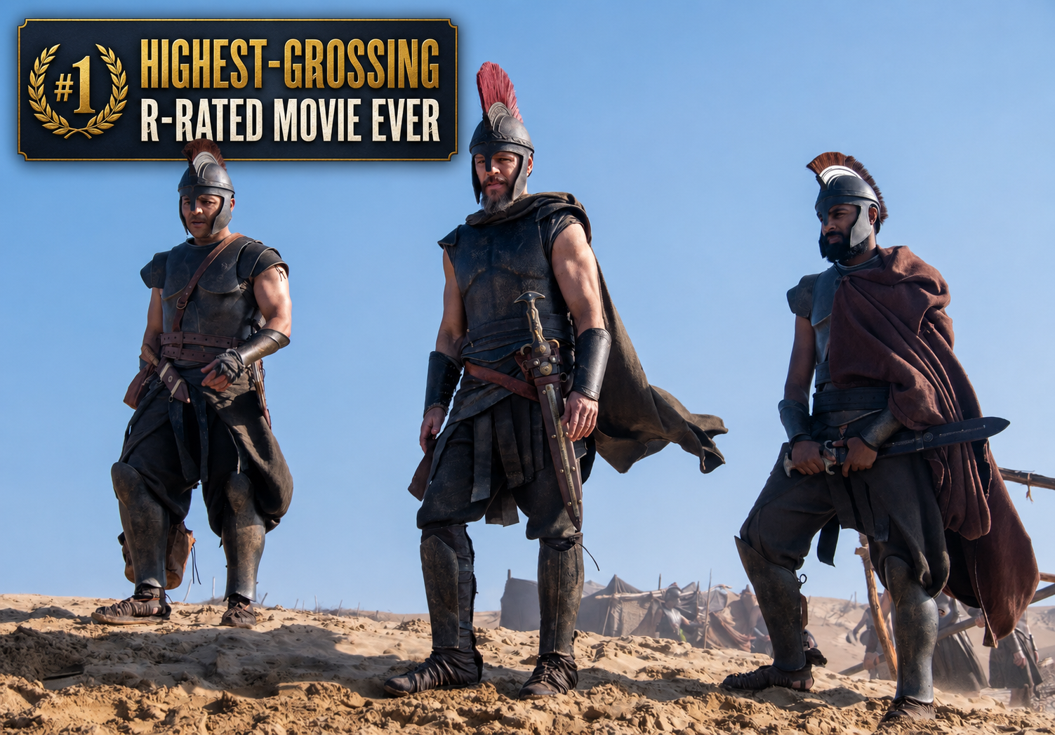 Three armored warriors from The Odyssey stand in a desert beneath a graphic declaring it the highest-grossing R-rated movie ever.