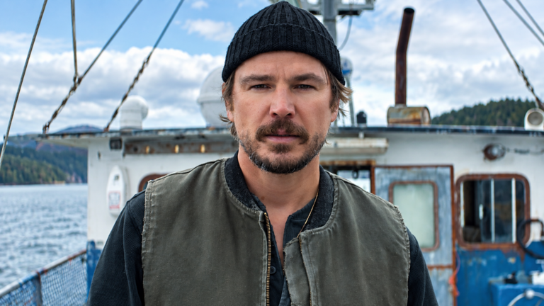 Josh Hartnett as Calvin Penney on a fishing boat in Netflix’s Below.