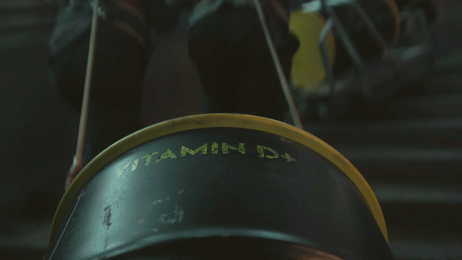 A barrel carries a fake Vitamin D label in Silo Season 3 Episode 9