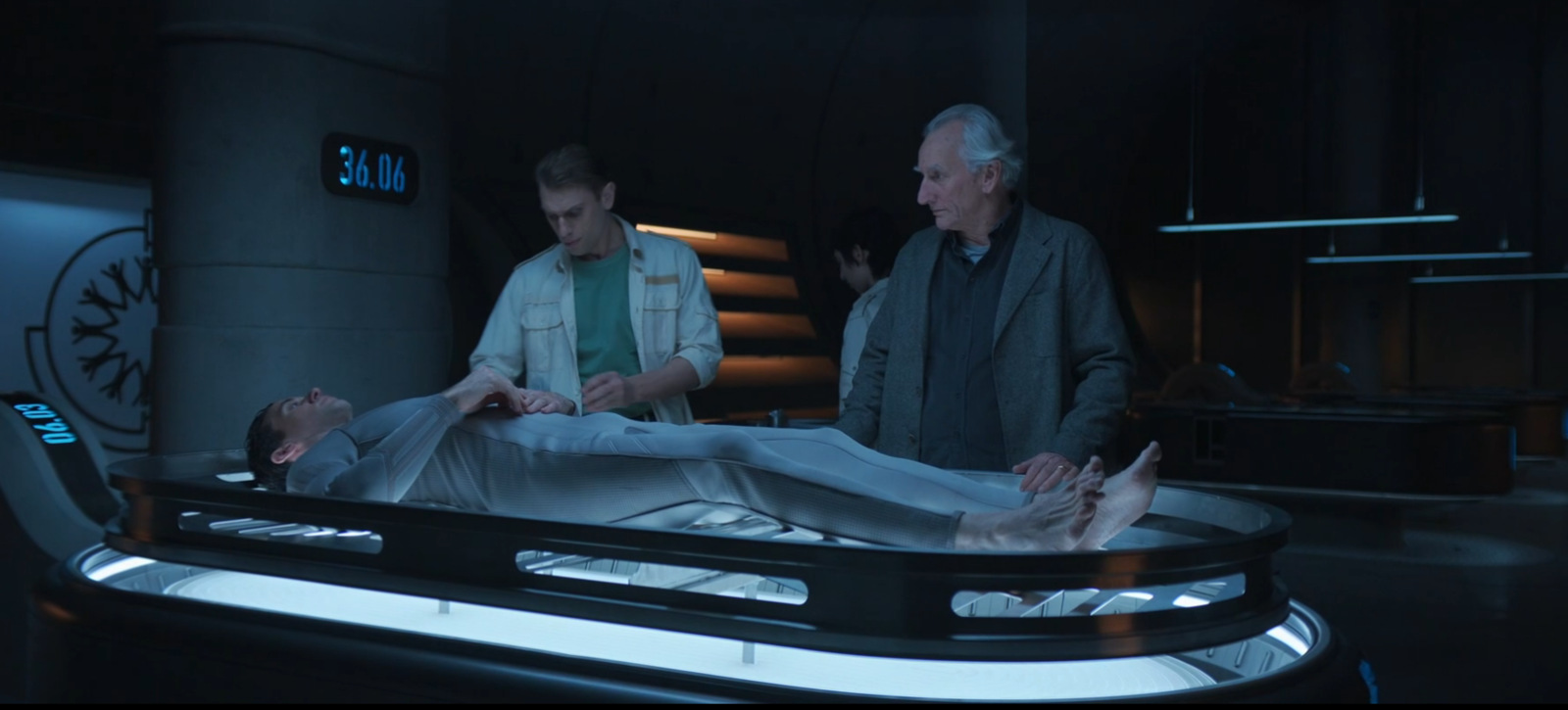Victor watches as Daniel is prepared inside a cryogenic pod in the Silo Season 3 finale